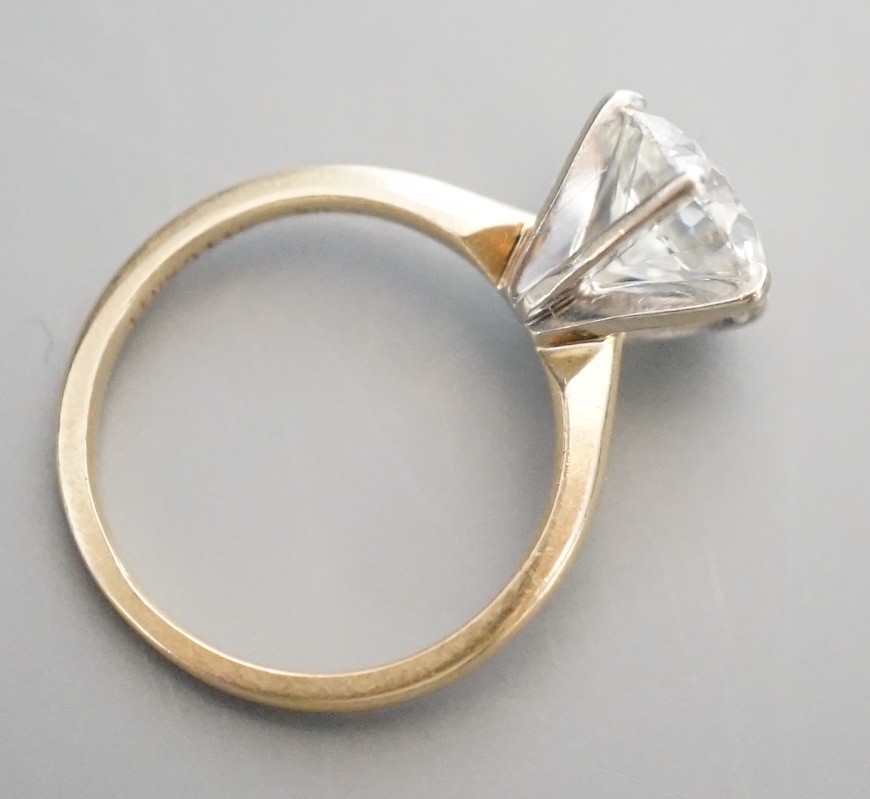 A 14k yellow metal and solitaire diamond ring, the stone weighing 2.04ct, size J/K, gross weight 3.1 grams